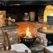 Picture of a bread oven circa 1300s- brick surrounding a fire pit structure